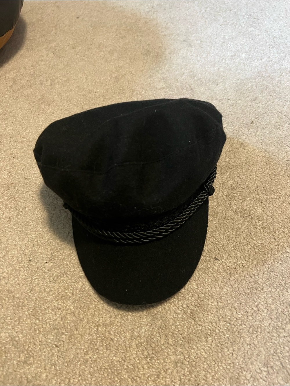 Stylish Black Baker Boy Cap with Braided Trim